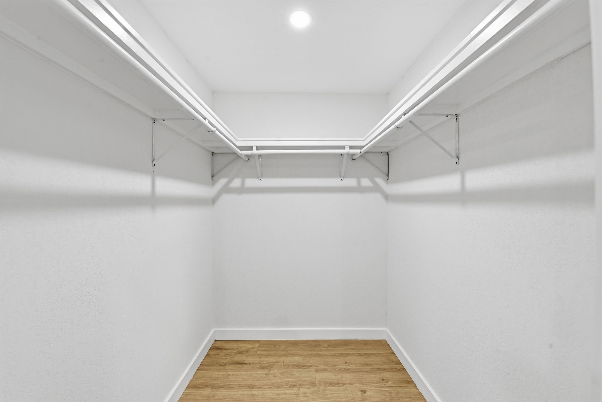 12319 Renwick Houston, TX 77035 - Photo 36 of 50 a view of a room with racks on the wall