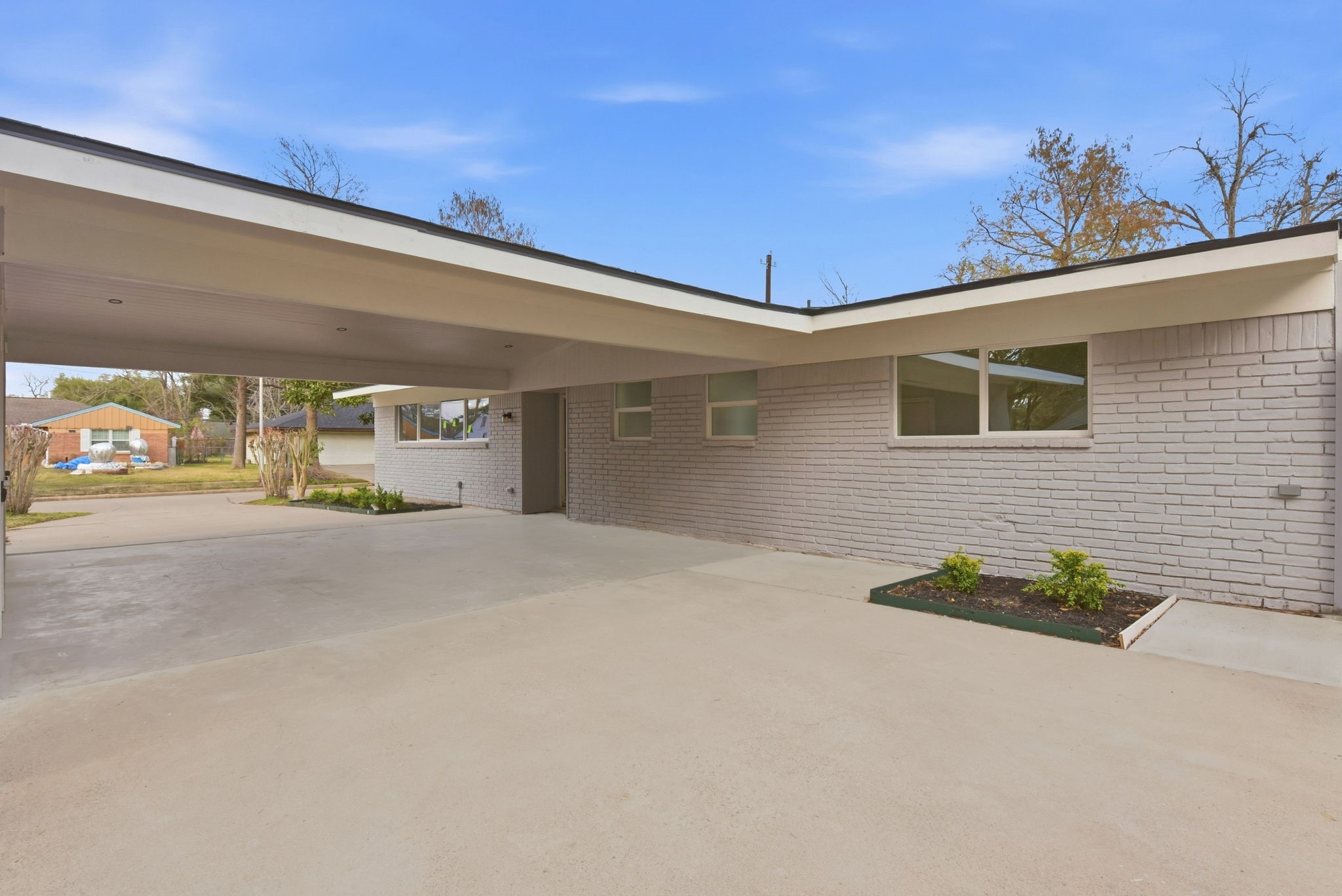 12319 Renwick Houston, TX 77035 - Photo 9 of 50 a picture of a building with a street