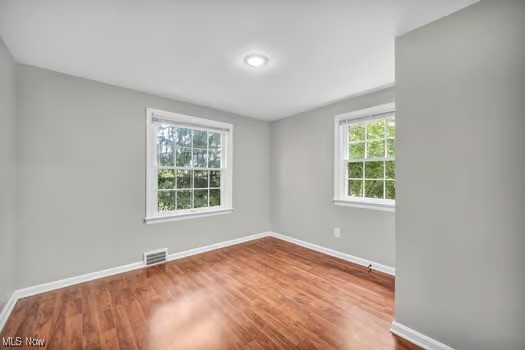 22790 Chardon Road Euclid, OH 44117 - Photo 20 of 35 Unfurnished room with wood-type flooring