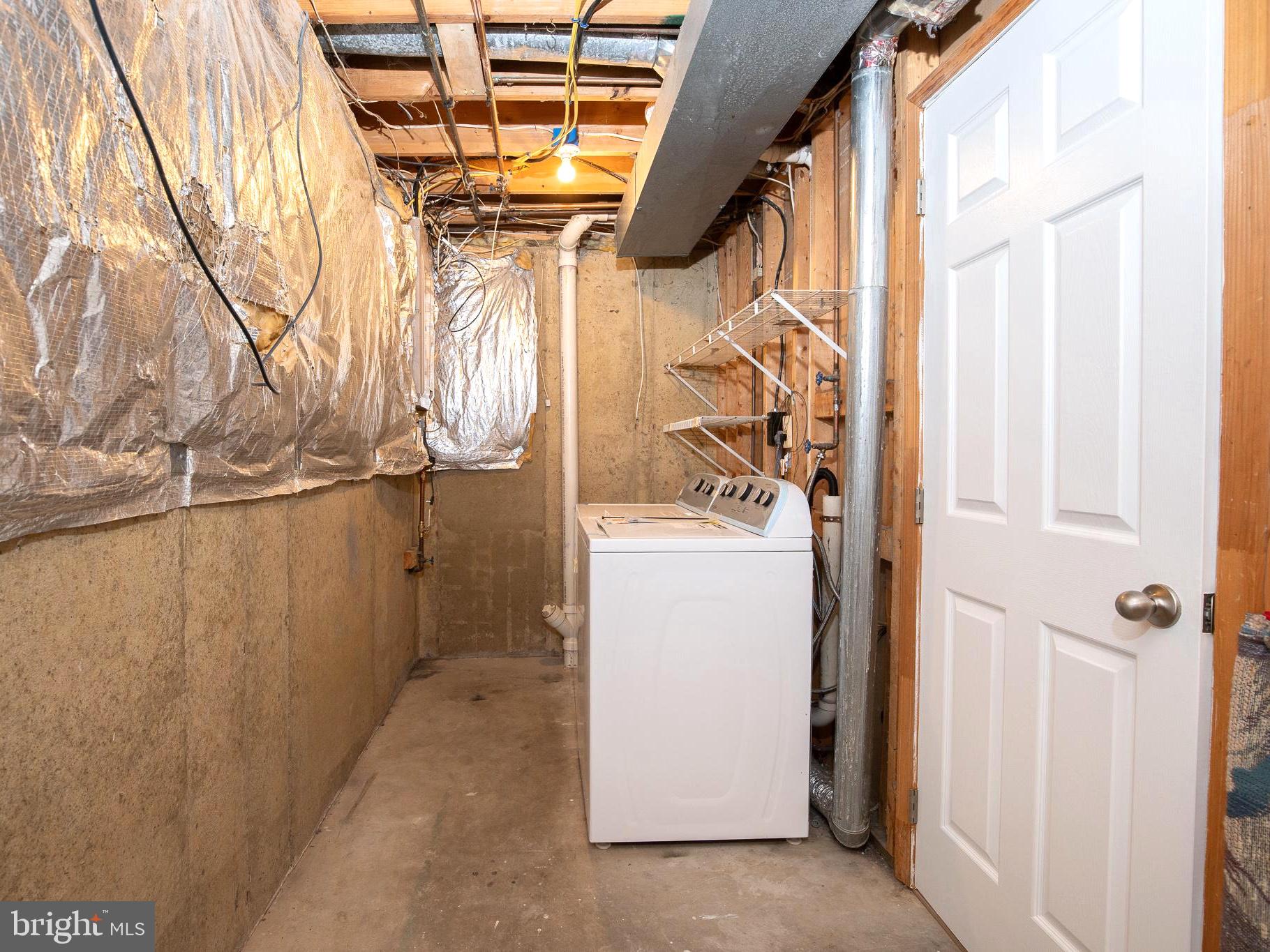 114 Gentlebrook Road Owings Mills, MD 21117 - Photo 19 of 20 Functional laundry space with potential.