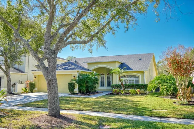 a view of a house with a big yard