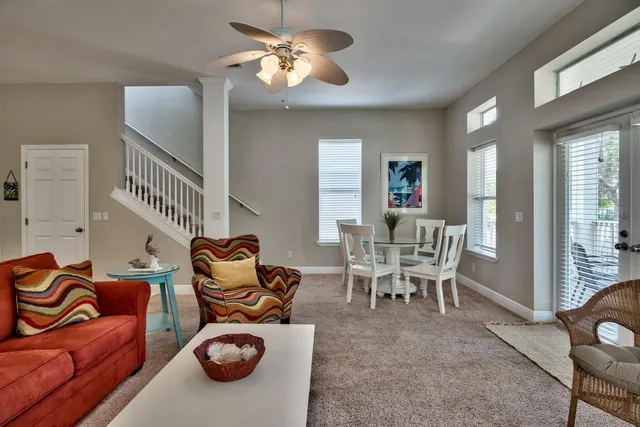 a view of a livingroom with furniture and lounge chair