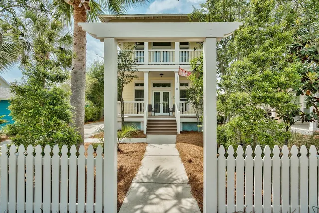 a front view of a house with a porch