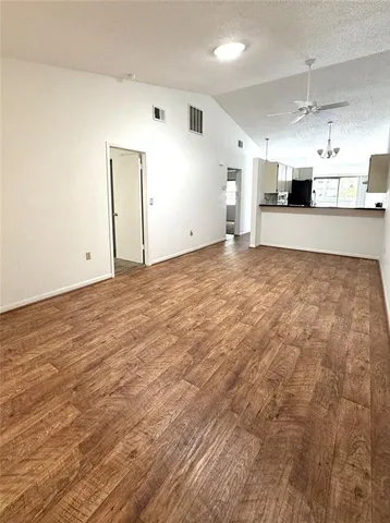 a view of a kitchen with a sink