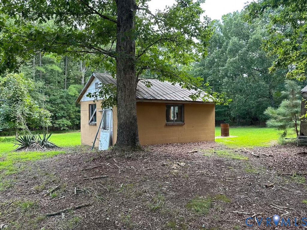 9701 Old Stage Road Prince George, VA 23875 - Photo 17 of 29 a view of backyard with green space