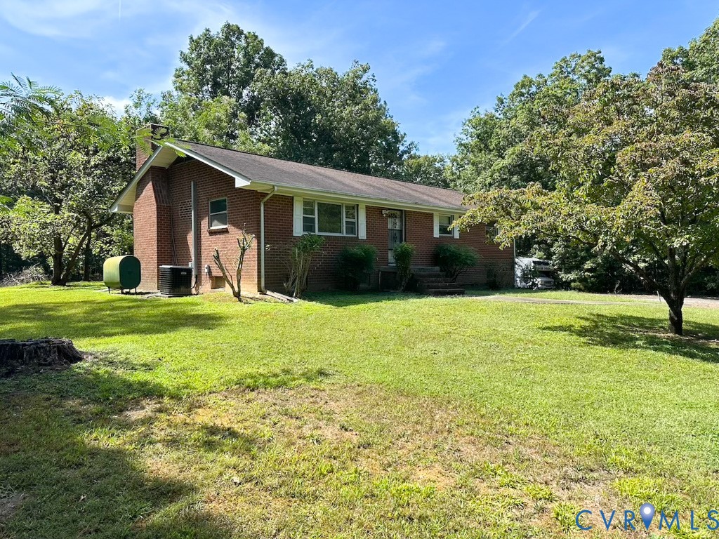 9701 Old Stage Road Prince George, VA 23875 - Photo 2 of 29 a view of a house with a yard