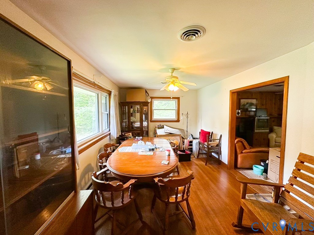 9701 Old Stage Road Prince George, VA 23875 - Photo 7 of 29 a view of a dining room with furniture and window