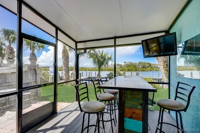 a view of a livingroom with furniture window and outside view