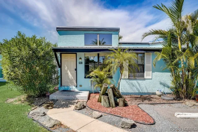 a front view of a house with a porch