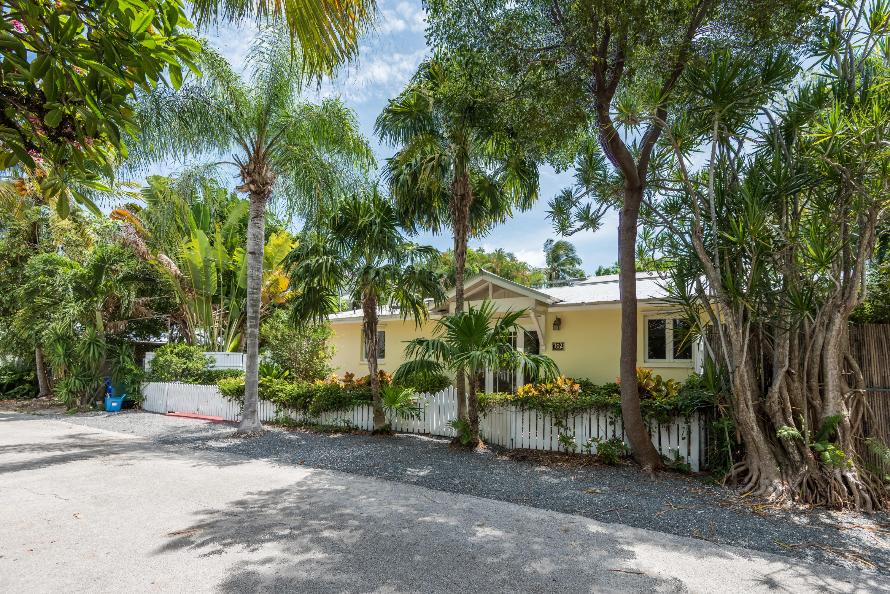 702 Florida Street Key West, FL 33040 - Photo 1 of 16 a view of a house with a tree in front