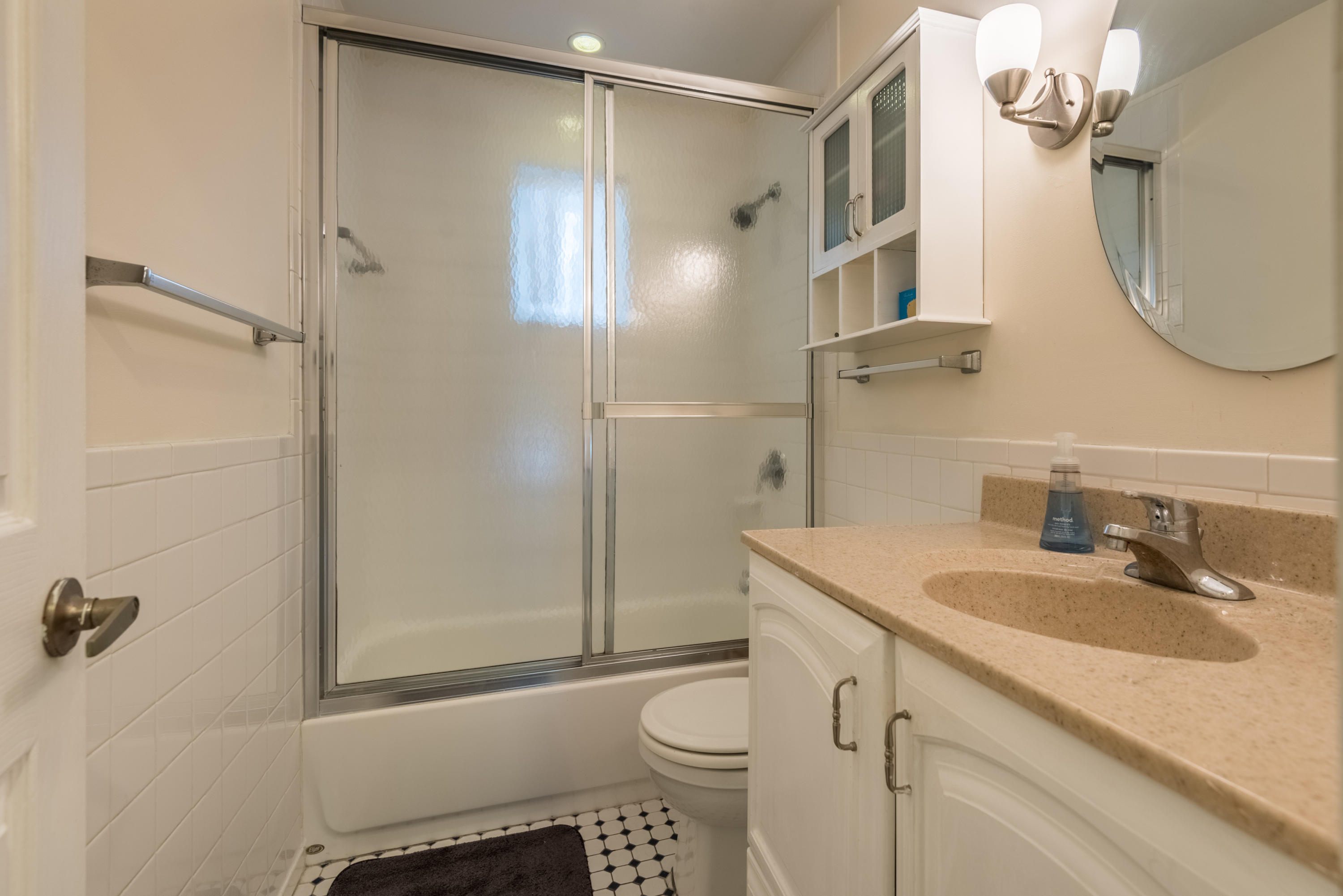 702 Florida Street Key West, FL 33040 - Photo 10 of 16 a bathroom with a sink a toilet and shower