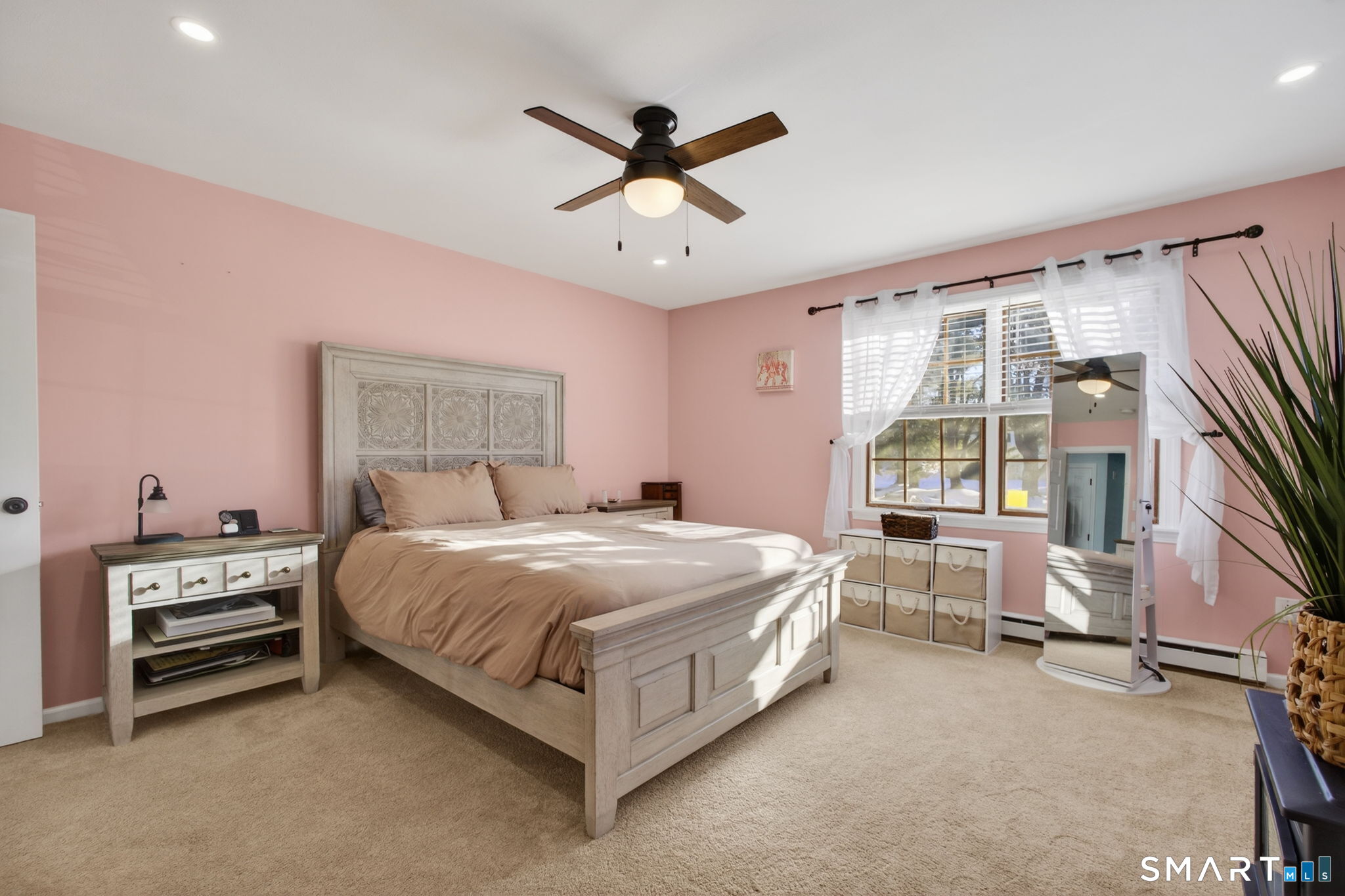 81 Founders Village, Unit 81 Clinton, CT 06413 - Photo 20 of 29 a bed room with a bed and a window