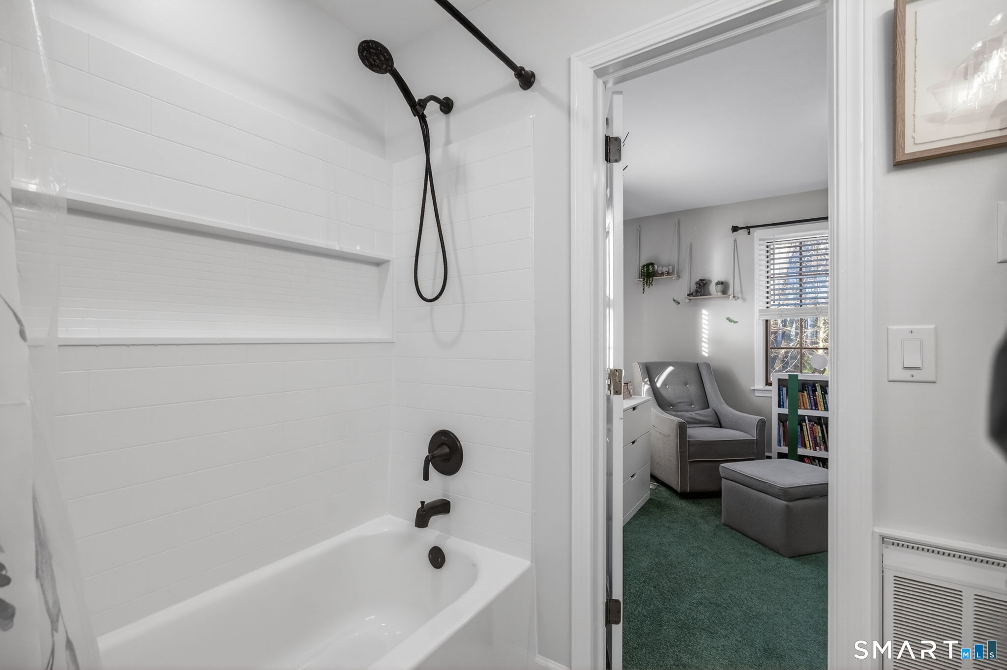 81 Founders Village, Unit 81 Clinton, CT 06413 - Photo 24 of 29 a bathroom with a bathtub shower and toilet