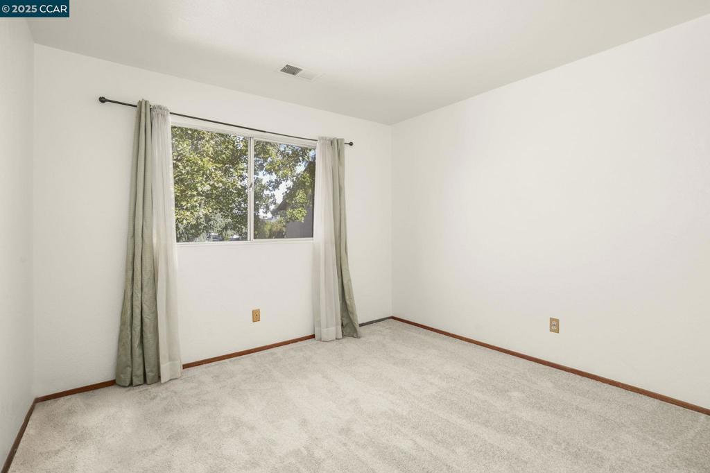 1440 Reganti Place Concord, CA 94518 - Photo 10 of 15 an empty room with a window