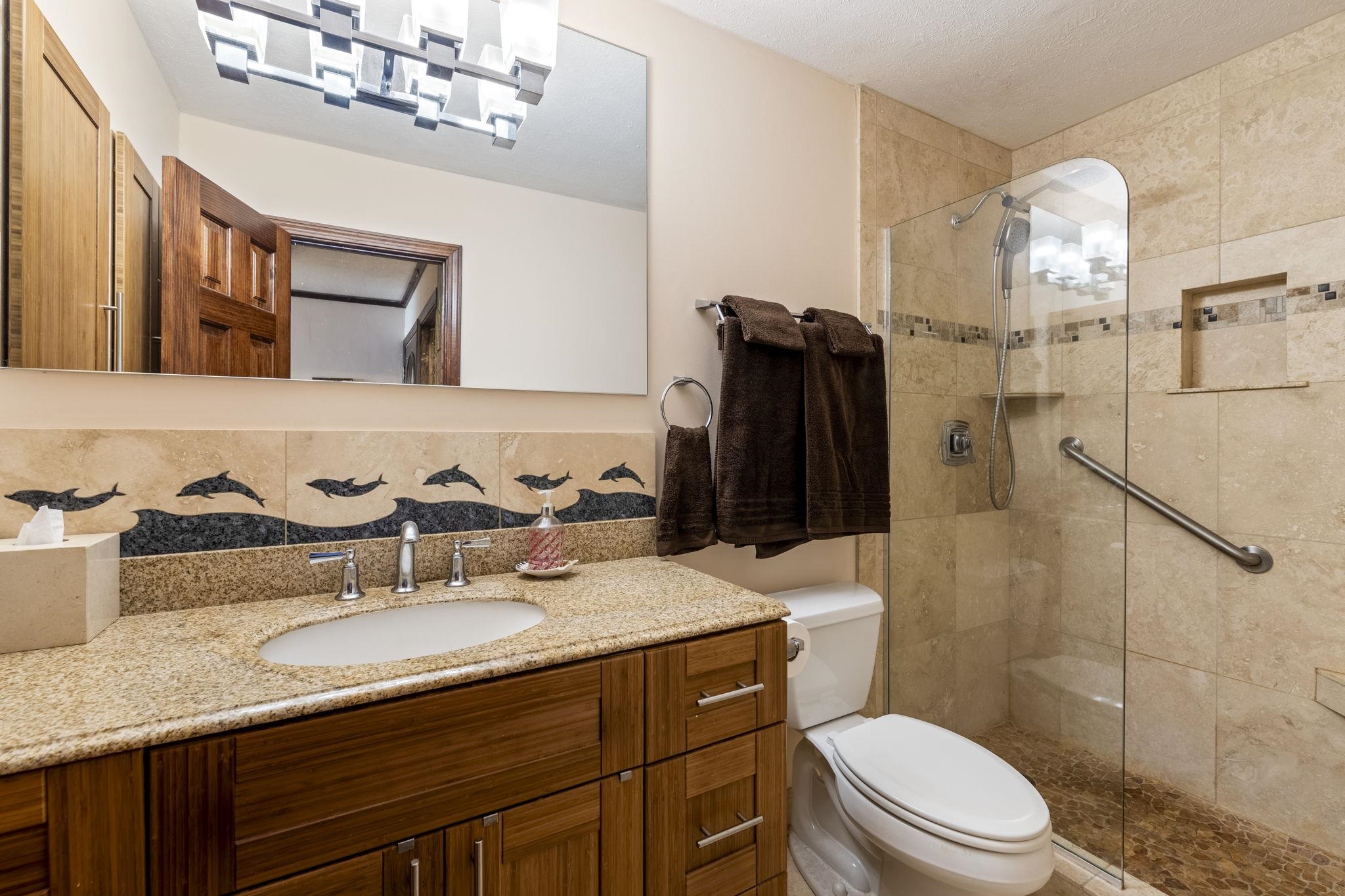 2075 South Kihei Road, Unit 214 Kihei, HI 96753 - Photo 26 of 50 a bathroom with a granite countertop sink toilet and shower
