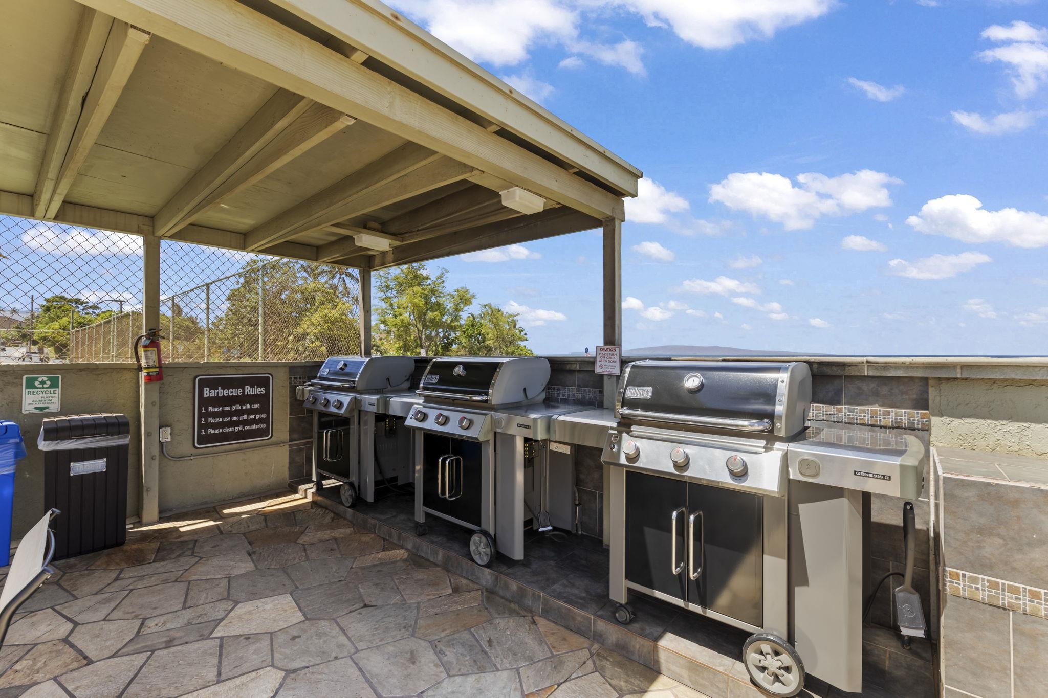 2075 South Kihei Road, Unit 214 Kihei, HI 96753 - Photo 47 of 50 a view of a kitchen with a stove and a microwave