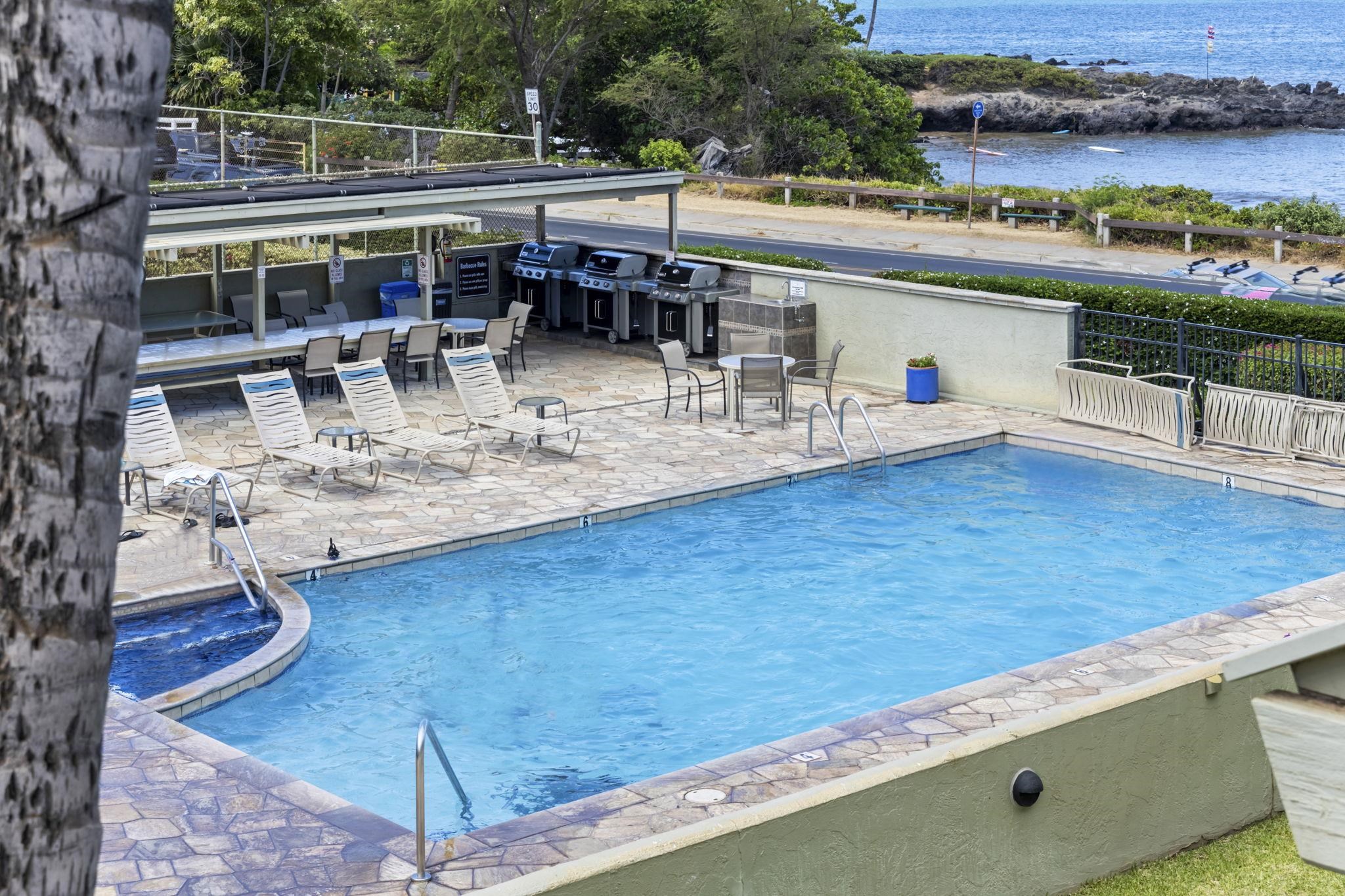 2075 South Kihei Road, Unit 214 Kihei, HI 96753 - Photo 49 of 50 an outdoor space with swimming pool and lake view
