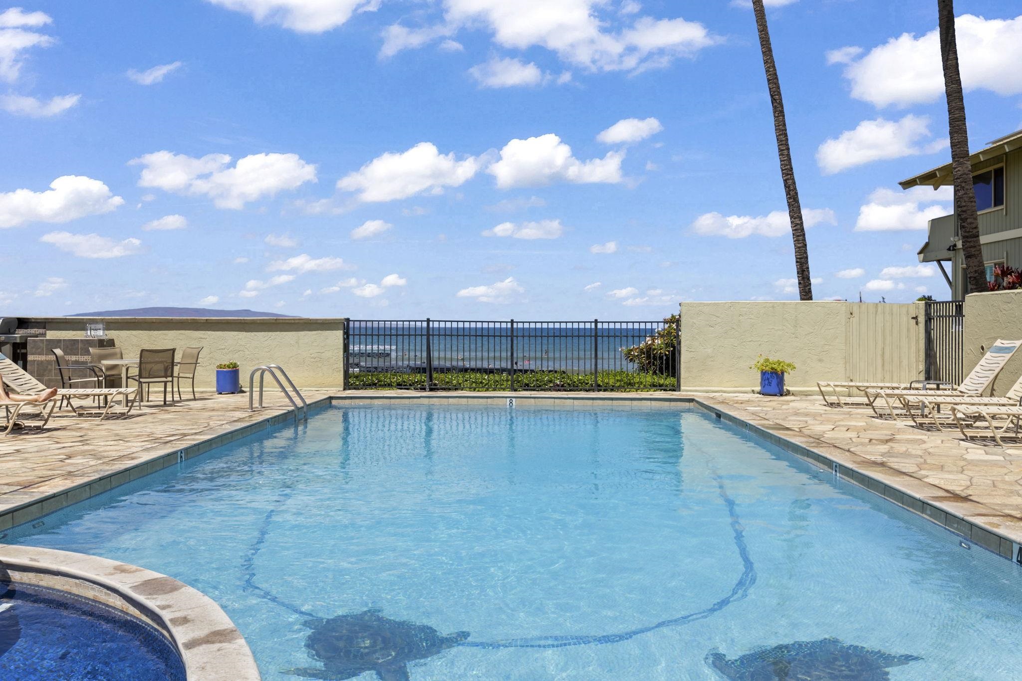 2075 South Kihei Road, Unit 214 Kihei, HI 96753 - Photo 50 of 50 a view of a kitchen with kitchen island and a stove