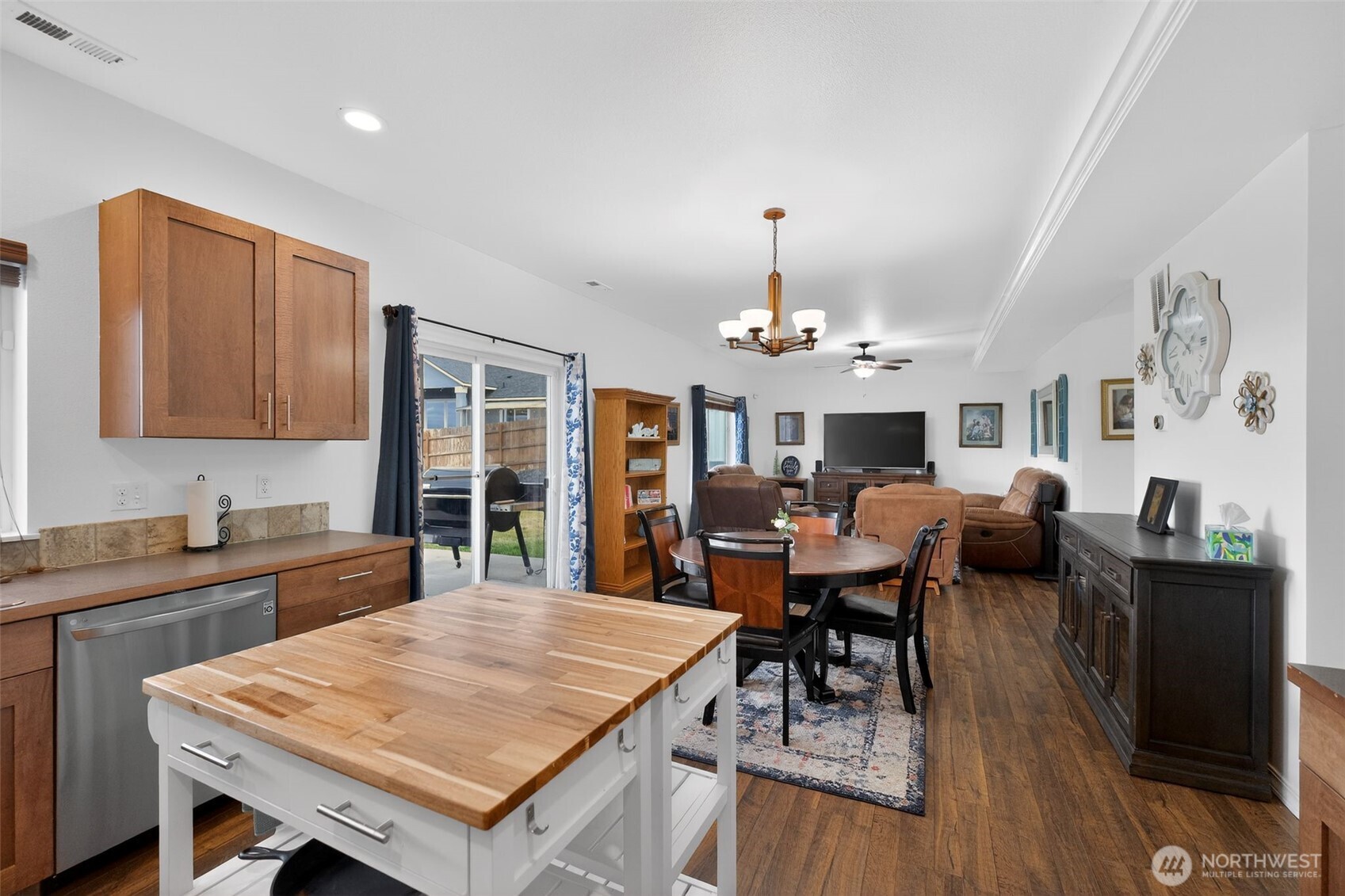 1427 West Century Street Moses Lake, WA 98837 - Photo 15 of 30 a view of a dining room with furniture window and wooden floor