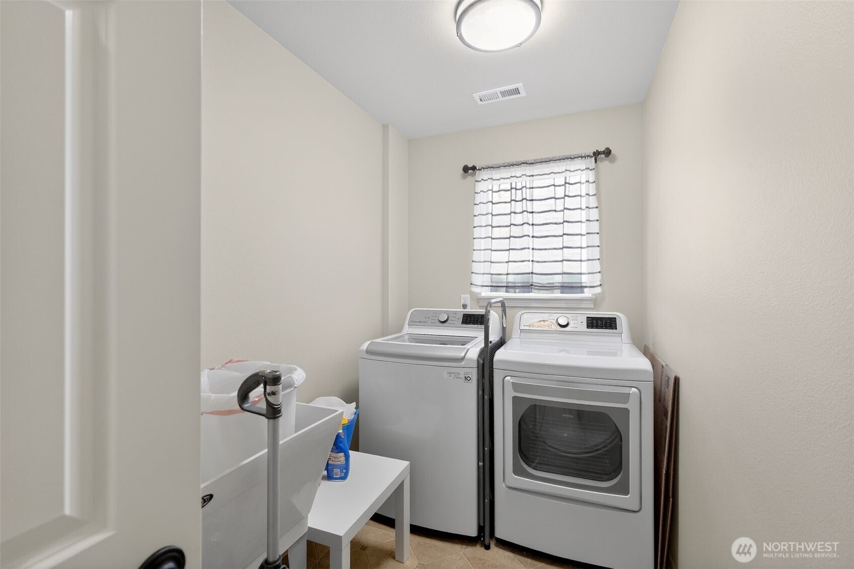 1427 West Century Street Moses Lake, WA 98837 - Photo 26 of 30 a utility room with dryer and washer