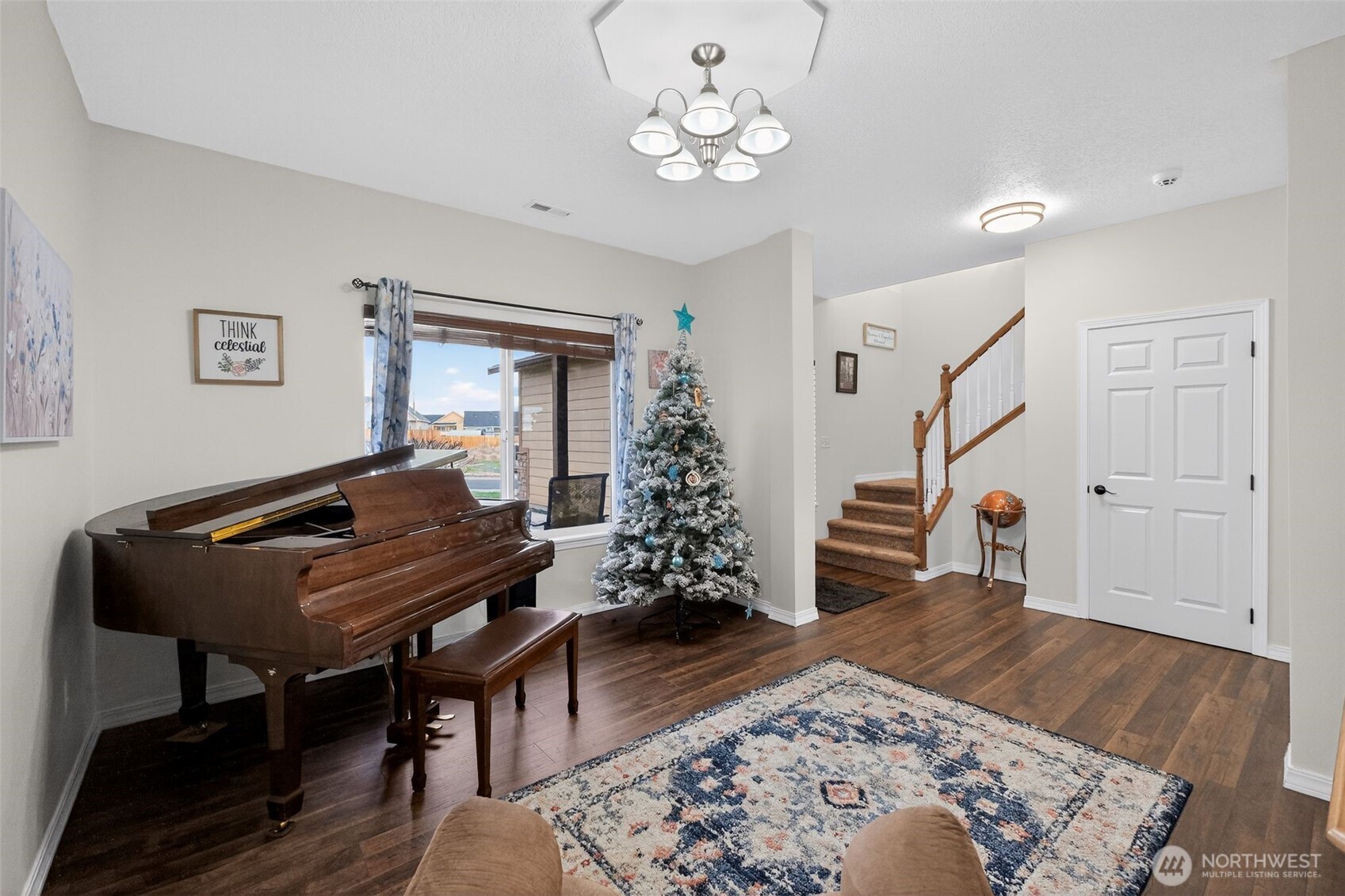 1427 West Century Street Moses Lake, WA 98837 - Photo 4 of 30 a living room with furniture and wooden floor