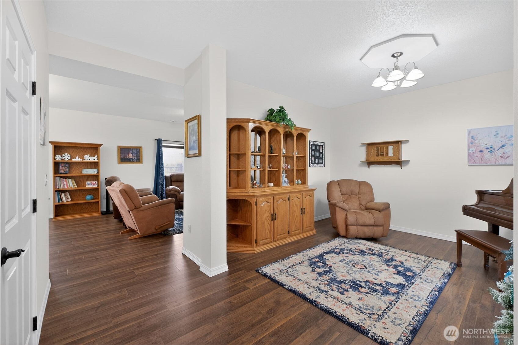 1427 West Century Street Moses Lake, WA 98837 - Photo 5 of 30 a living room with furniture and wooden floor
