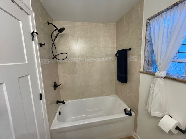 446 East 90th Street Chicago, IL 60619 - Photo 14 of 36 a bathroom with a shower and a bath tub
