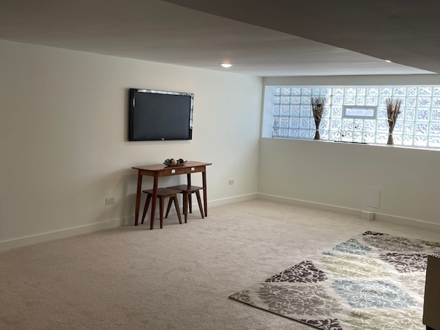 446 East 90th Street Chicago, IL 60619 - Photo 27 of 36 a livingroom with a window