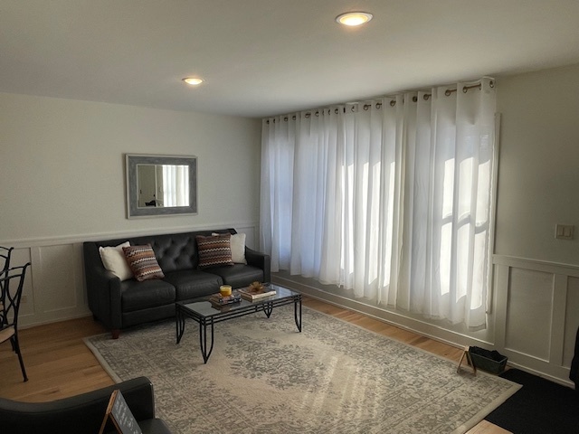 446 East 90th Street Chicago, IL 60619 - Photo 5 of 36 a living room with furniture and a window