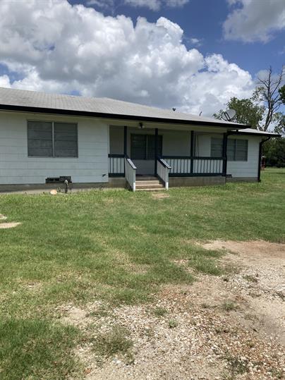 12341 Highway 21 Midway, TX 75852 - Photo 2 of 10 a backyard of a house with lots of green space