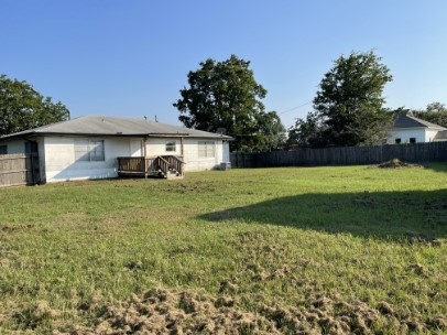12341 Highway 21 Midway, TX 75852 - Photo 3 of 10 a front view of a house with a yard