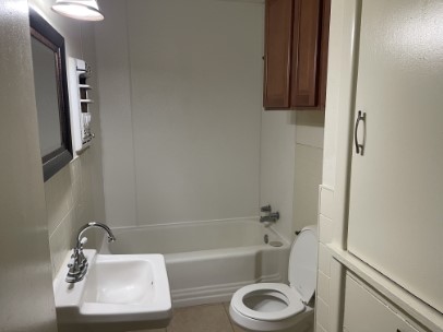 12341 Highway 21 Midway, TX 75852 - Photo 6 of 10 a bathroom with a sink toilet and shower