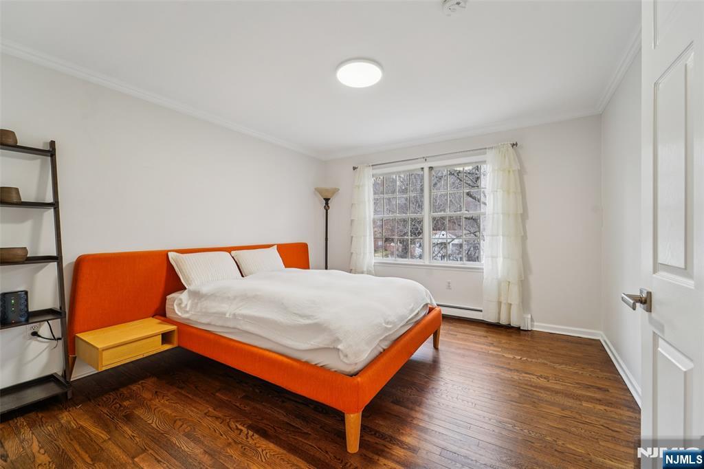 185 Summit Avenue Pompton Lakes, NJ 07442 - Photo 21 of 36 a bedroom with a bed and a window