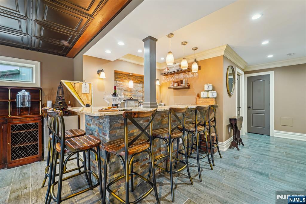 185 Summit Avenue Pompton Lakes, NJ 07442 - Photo 26 of 36 a view of a dining room with furniture and wooden floor