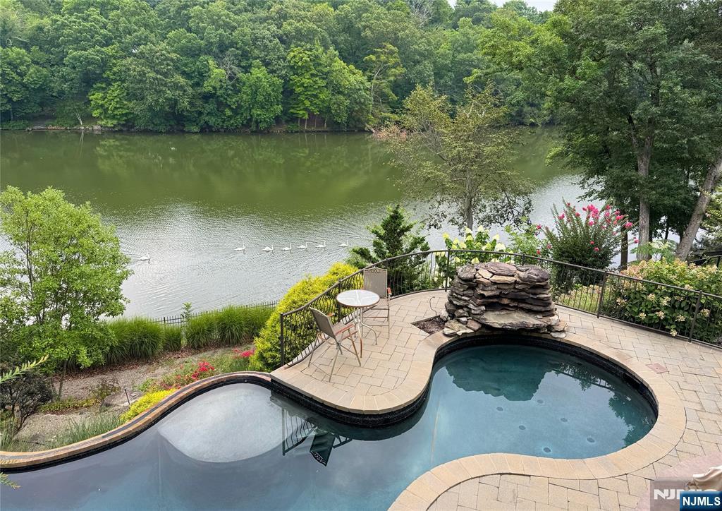185 Summit Avenue Pompton Lakes, NJ 07442 - Photo 33 of 36 swimming pool view with a garden space