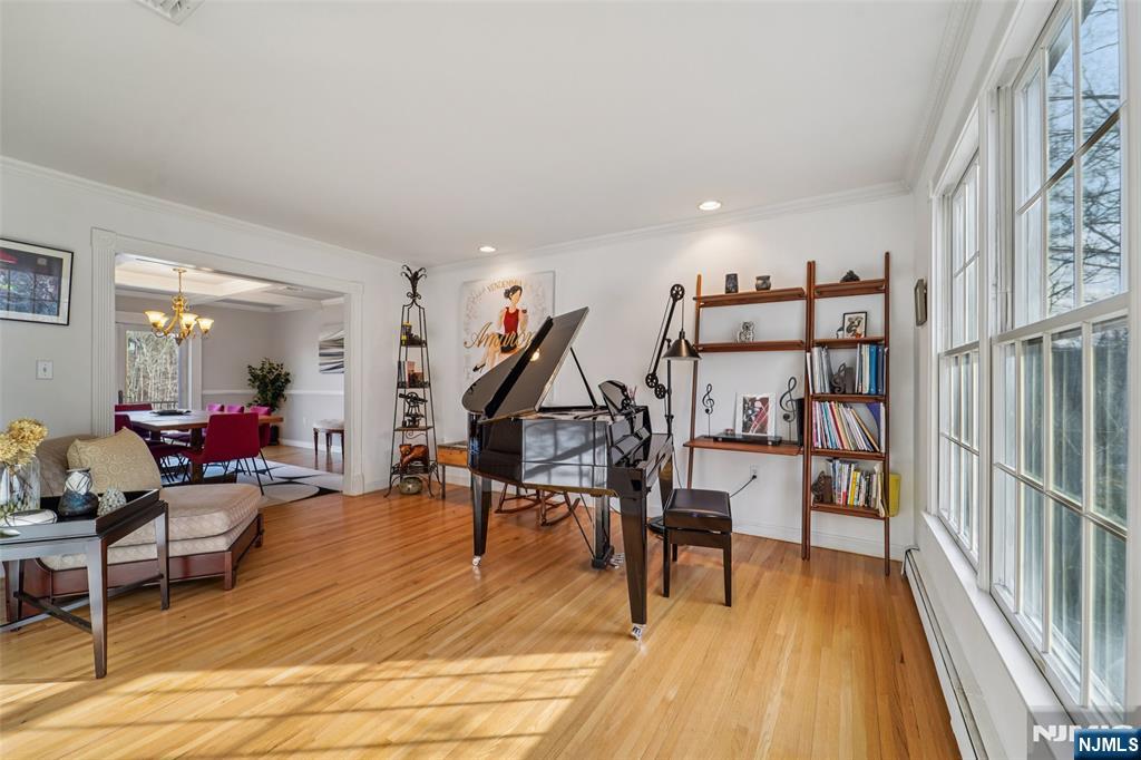 185 Summit Avenue Pompton Lakes, NJ 07442 - Photo 6 of 36 a view of a livingroom with furniture and wooden floor