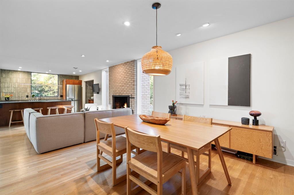 7320 Walling Lane Dallas, TX 75231 - Photo 12 of 40 a kitchen with a table and chairs in it
