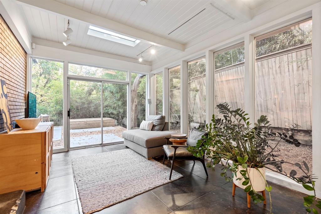 7320 Walling Lane Dallas, TX 75231 - Photo 14 of 40 a living room with furniture and a large window