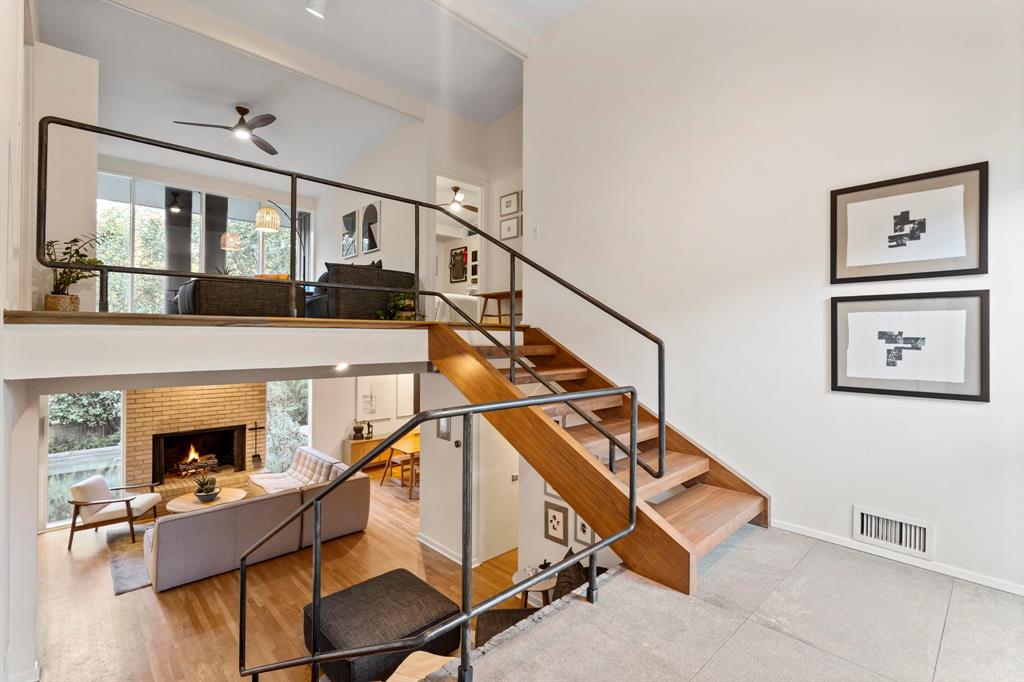 7320 Walling Lane Dallas, TX 75231 - Photo 15 of 40 a living room with table chairs and a stove