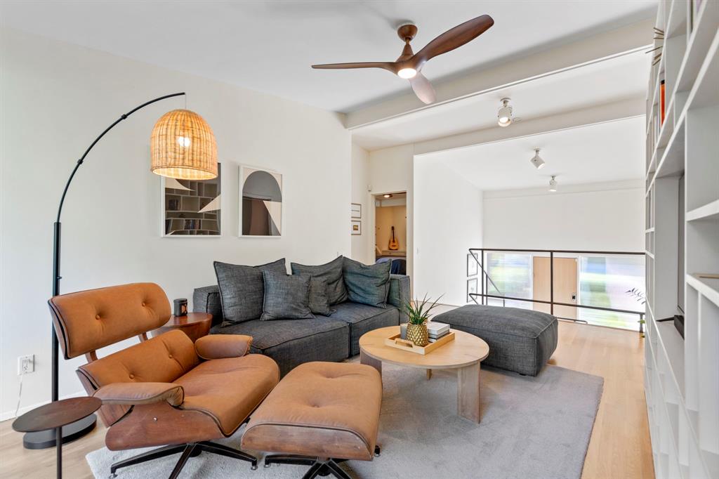 7320 Walling Lane Dallas, TX 75231 - Photo 19 of 40 a living room with furniture and a large window