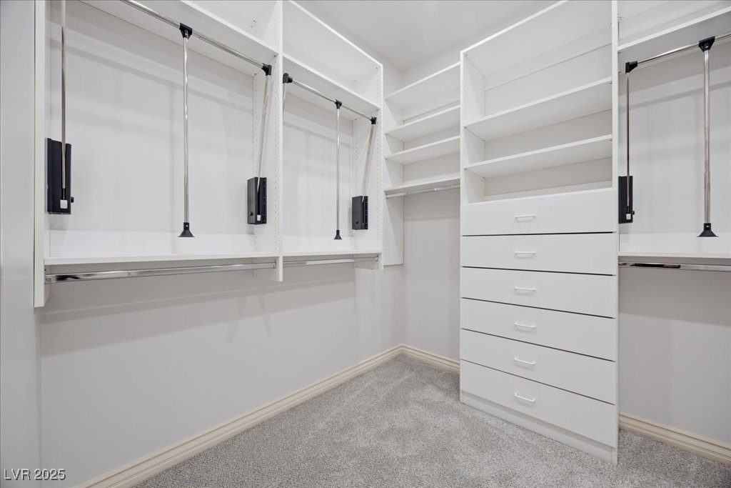 640 Quail Covey Road Henderson, NV 89002 - Photo 15 of 75 2nd Primary Bedroom Spacious closet with carpet floors