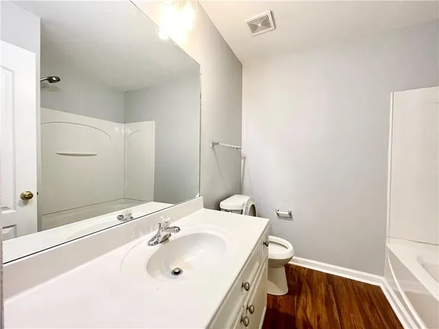 a bathroom with a sink and a toilet