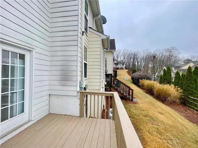 a view of balcony with furniture