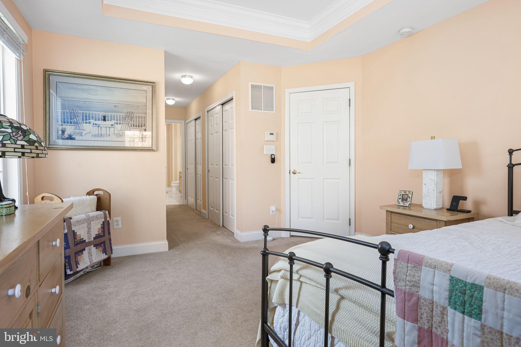 24 Longview Lane Newtown Square, PA 19073 - Photo 16 of 32 a bedroom with a bed and furniture
