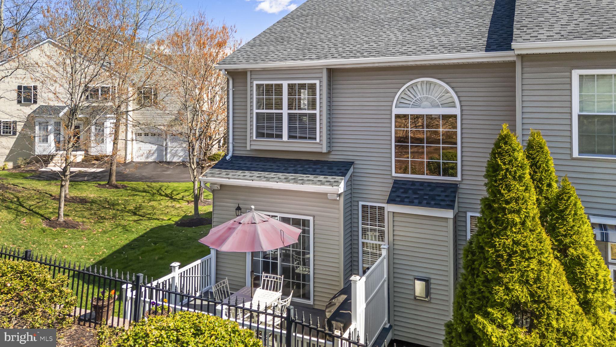 24 Longview Lane Newtown Square, PA 19073 - Photo 27 of 32 a front view of a house with garden