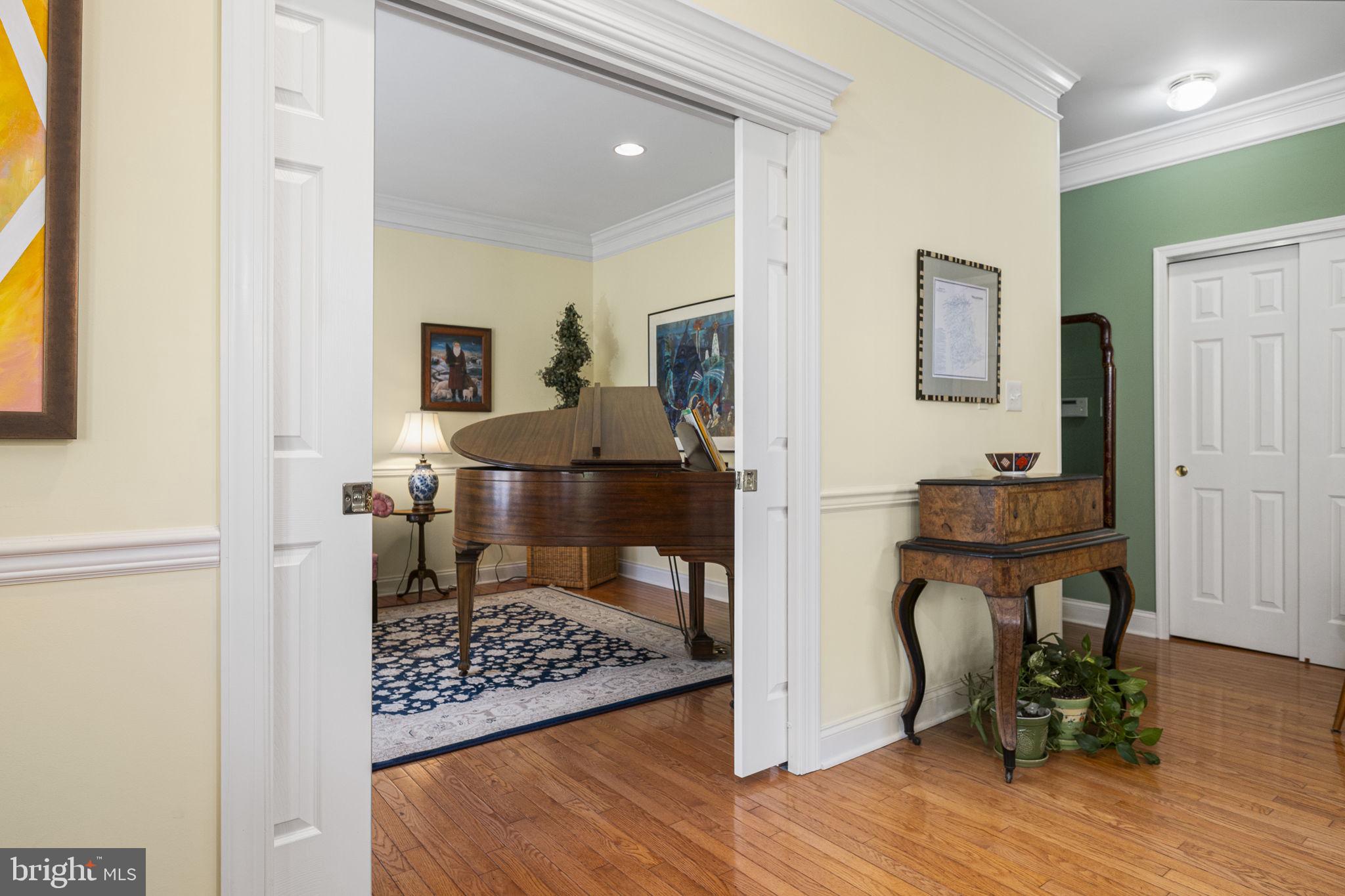24 Longview Lane Newtown Square, PA 19073 - Photo 9 of 32 a living room with furniture and a table
