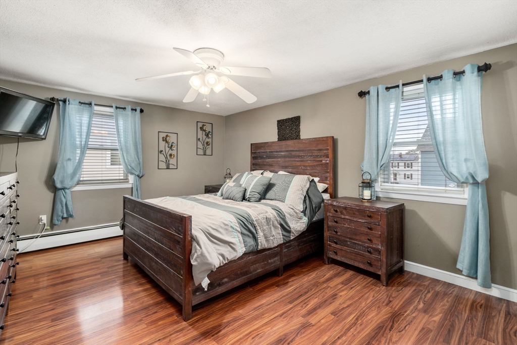 15 Farrin Street Boston, MA 02136 - Photo 11 of 22 a bed room with a bed and a window