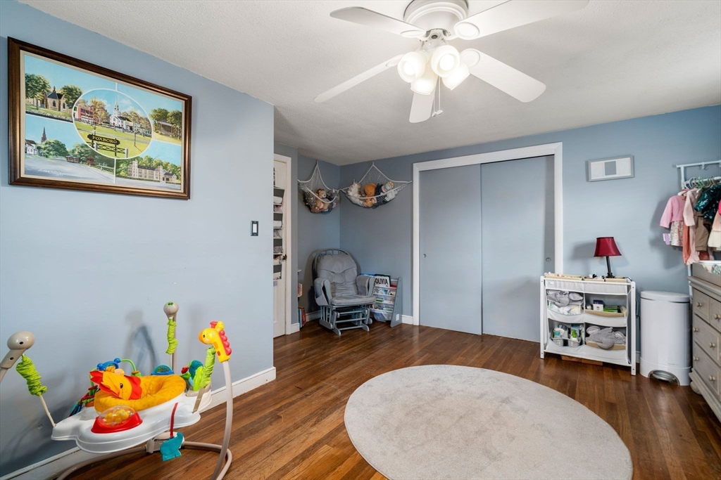 15 Farrin Street Boston, MA 02136 - Photo 14 of 22 a living room with furniture and a wooden floor