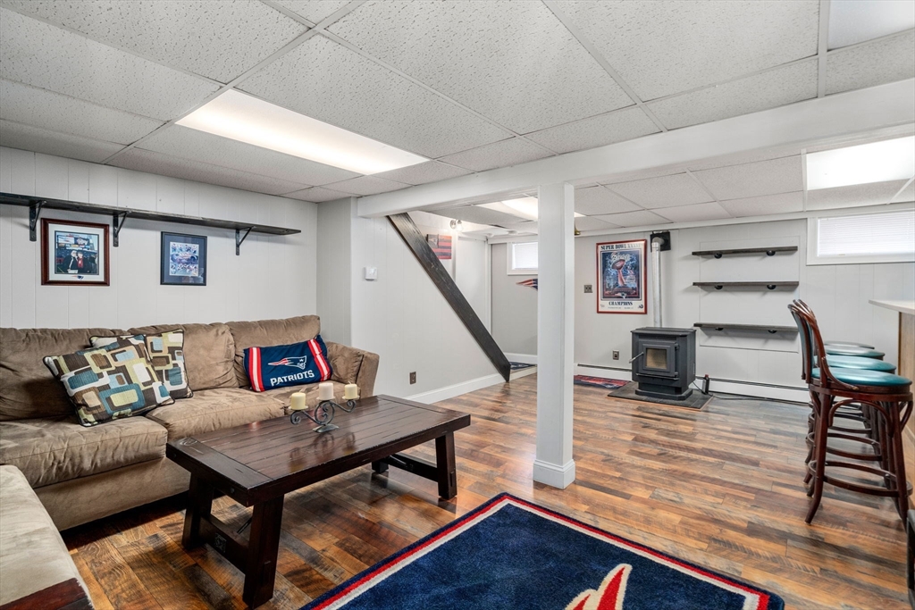 15 Farrin Street Boston, MA 02136 - Photo 17 of 22 a living room with furniture and wooden floor