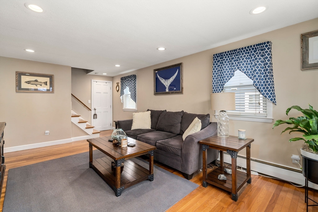 15 Farrin Street Boston, MA 02136 - Photo 2 of 22 a living room with furniture and a wooden floor